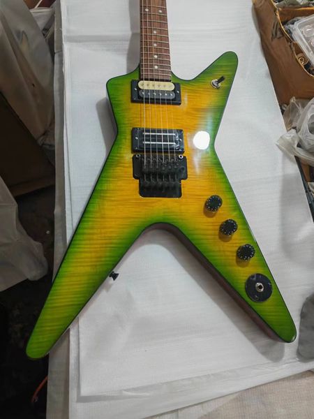 new custom grands guitar shop, iconic electric guitar with skull case, engraving, green circle yellow decoration
new custom grands guitar shop, iconic electric guitar with skull case, engraving, green circle yellow decoration