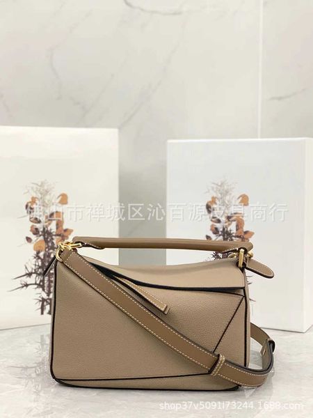 original factory leather color matching lychee plain creative splicing sand color puzzle geometric splicing bag women's handbag
original factory leather color matching lychee plain creative splicing sand color puzzle geometric splicing bag women's handbag