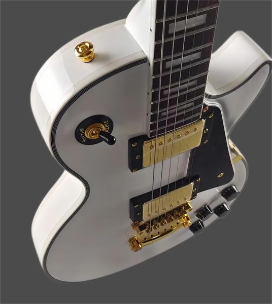 custom electric guitar made of mahogany white glitter imported paint gold accessories available
custom electric guitar made of mahogany white glitter imported paint gold accessories available