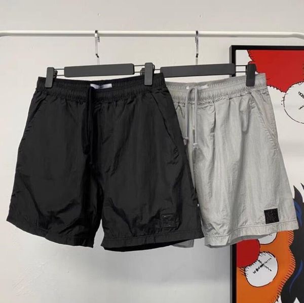 designer nylon men's stone shorts compass embroidered logo men's breathable sports shorts casual loose quick dried pants keen leng, White;black
designer nylon men's stone shorts compass embroidered logo men's breathable sports shorts casual loose quick dried pants keen leng, White;black