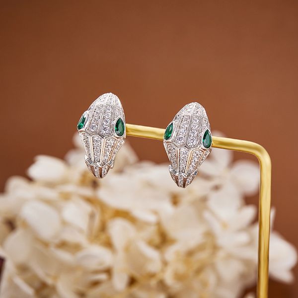 designer collection stud earrings inlay czech zircon diamond plated gold color white green eyes snake serpent snakelike ear clip, Golden;silver
designer collection stud earrings inlay czech zircon diamond plated gold color white green eyes snake serpent snakelike ear clip, Golden;silver