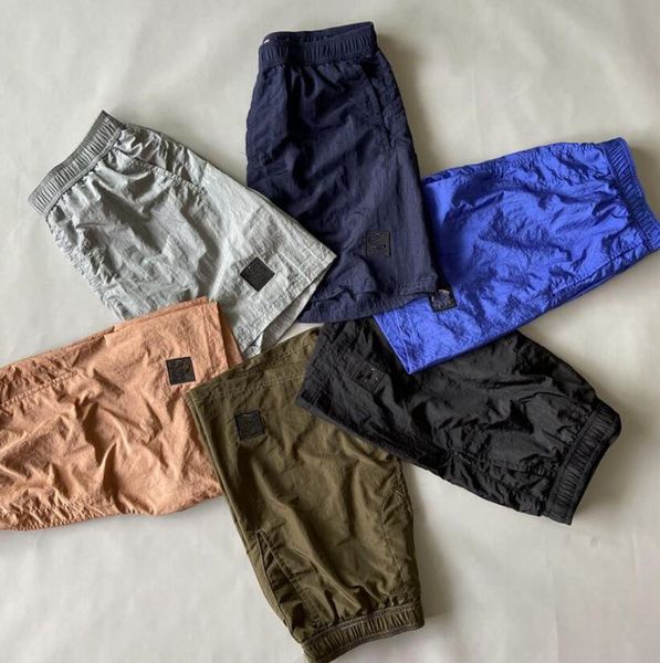men's stone shorts classic brand mens outdoor casual shorts loose quick drying breathable compass embroidered armband nylon shorts summ, White;black
men's stone shorts classic brand mens outdoor casual shorts loose quick drying breathable compass embroidered armband nylon shorts summ, White;black