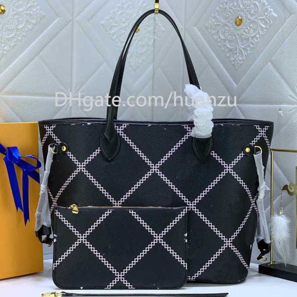 luxurious designer embossed tote bag genuine leather womens shoulder bag with large capacity versatile and fashionable commuting handbag
luxurious designer embossed tote bag genuine leather womens shoulder bag with large capacity versatile and fashionable commuting handbag