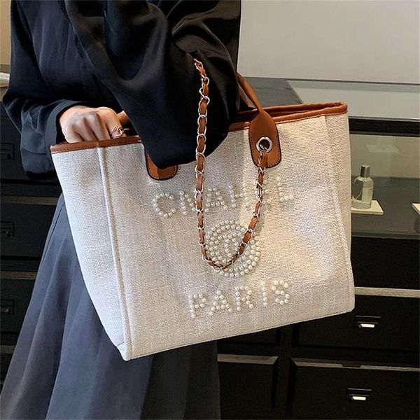 large capacity canvas tote bag for women's 2023 summer new pearl design tote bag for niche texture underarm bag 60% factory outlet sale
large capacity canvas tote bag for women's 2023 summer new pearl design tote bag for niche texture underarm bag 60% factory outlet sale