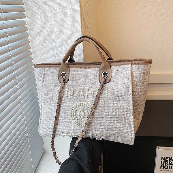 2023 new little fresh ladies style handbag tote bag pearl beaded letter decorative women's bag ins
2023 new little fresh ladies style handbag tote bag pearl beaded letter decorative women's bag ins