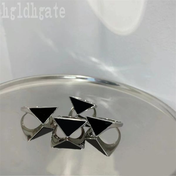symbole designer rings for women ring triangle solid black plated silver letter classic bague homme hip hop punk size wedding ring couples l
symbole designer rings for women ring triangle solid black plated silver letter classic bague homme hip hop punk size wedding ring couples l