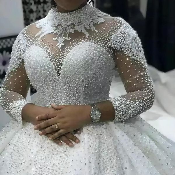 arabic dubai women' wedding dress 2023 high neck illusion long sleeves beads pearls african puffy princess bridal gown vestidos de nov, White
arabic dubai women' wedding dress 2023 high neck illusion long sleeves beads pearls african puffy princess bridal gown vestidos de nov, White