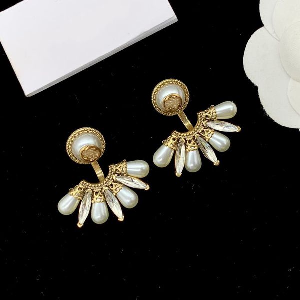 with pouch extravagant style stud hoops logo printed luxury brass women designer earrings, Golden;silver
with pouch extravagant style stud hoops logo printed luxury brass women designer earrings, Golden;silver