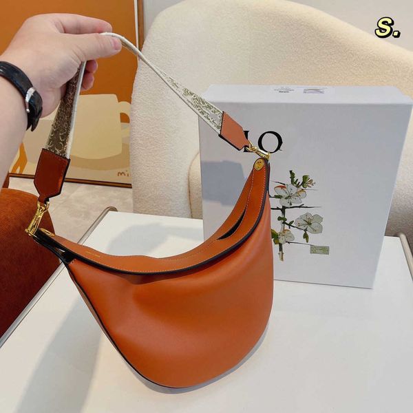 new soft leather underarm bag moon embroidered strap shoulder casual large capacity versatile fashion trendy
new soft leather underarm bag moon embroidered strap shoulder casual large capacity versatile fashion trendy