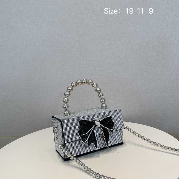 bag 2023 new korean little fresh water diamond pearl chain bowknot small square bag handheld one shoulder crossbody bag 230613
bag 2023 new korean little fresh water diamond pearl chain bowknot small square bag handheld one shoulder crossbody bag 230613