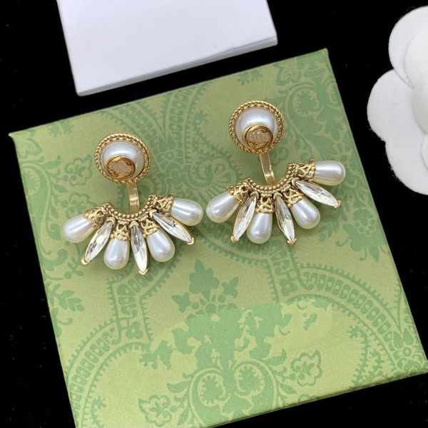 with pouch women designer stud earrings white pearl extravagant style trendy brass luxury engagement hoop, Golden;silver
with pouch women designer stud earrings white pearl extravagant style trendy brass luxury engagement hoop, Golden;silver