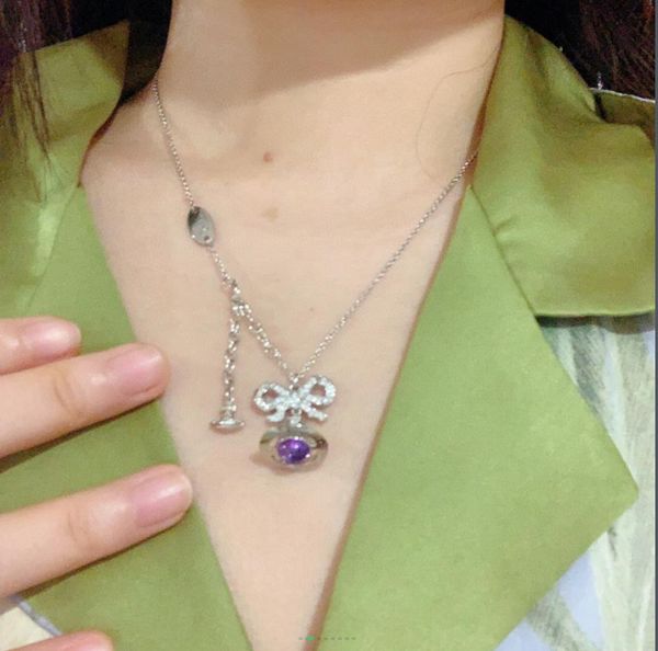 pendant necklaces designer brands from europe and america are popular in jewelry, with silver bows and diamonds hanging on purple bead neckl
pendant necklaces designer brands from europe and america are popular in jewelry, with silver bows and diamonds hanging on purple bead neckl