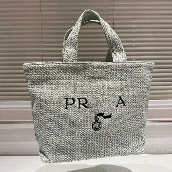 p family 23 new women's embroidered lafite woven handbag small tote bag original copy
p family 23 new women's embroidered lafite woven handbag small tote bag original copy