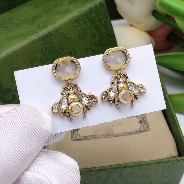 designer earring double g brand stud earing luxury letter logo pearl earring women fashion hoop jewelry metal ggity crystal charm women', Golden
designer earring double g brand stud earing luxury letter logo pearl earring women fashion hoop jewelry metal ggity crystal charm women', Golden