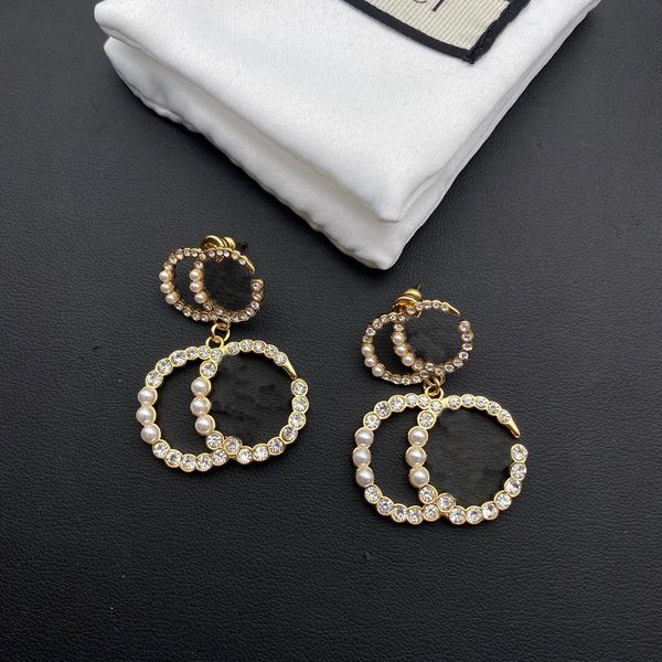 with pouch luxury stud small white pearl trendy brass engagement women designer earrings, Golden;silver
with pouch luxury stud small white pearl trendy brass engagement women designer earrings, Golden;silver
