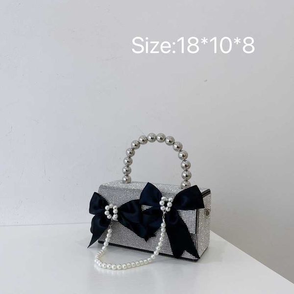 women's 2023 new korean net red contrast bow knot pearl chain rhinestone handheld one shoulder crossbody bag 230613
women's 2023 new korean net red contrast bow knot pearl chain rhinestone handheld one shoulder crossbody bag 230613