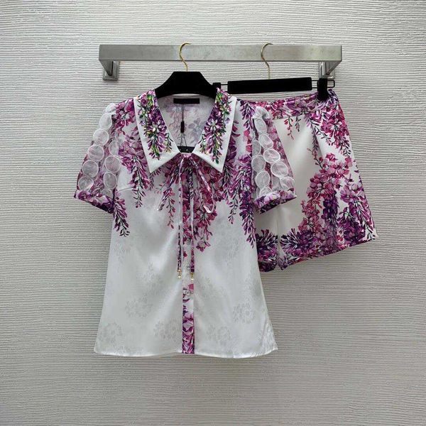 23ss women shorts sets women designer clothes flower print fashion heavy work inlaid with diamond stud lapel short sleeve shirt wide leg sho, White
23ss women shorts sets women designer clothes flower print fashion heavy work inlaid with diamond stud lapel short sleeve shirt wide leg sho, White