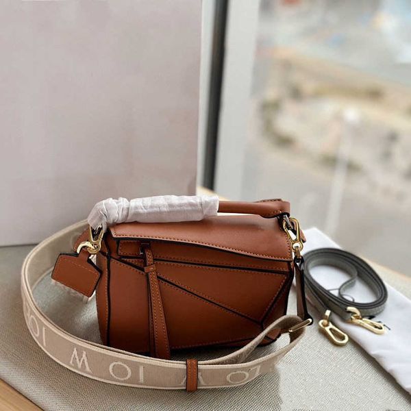 high-end leather designer handbags new puzzle geometric bag embroidered wide shoulder strap mini panel diamond checker large capacity crossb
high-end leather designer handbags new puzzle geometric bag embroidered wide shoulder strap mini panel diamond checker large capacity crossb