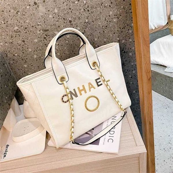 luxury women's classic handbags beach bags metal badge tote bag designer small evening handbag female capacity large leather one should
luxury women's classic handbags beach bags metal badge tote bag designer small evening handbag female capacity large leather one should