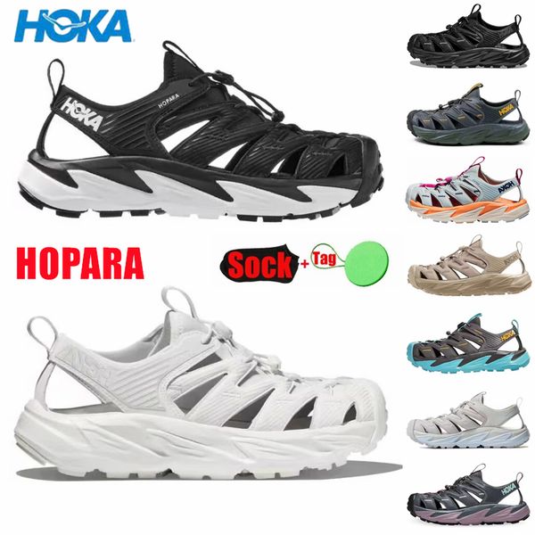 hoka hopara designer sandals men women hoka one shock absorbing walking function triple black sand luxurys ora recovery slide 3 dad slides s
hoka hopara designer sandals men women hoka one shock absorbing walking function triple black sand luxurys ora recovery slide 3 dad slides s