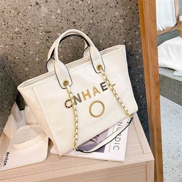 luxury women's classic handbags beach bags metal badge tote bag designer small evening handbag female capacity large leather one should
luxury women's classic handbags beach bags metal badge tote bag designer small evening handbag female capacity large leather one should
