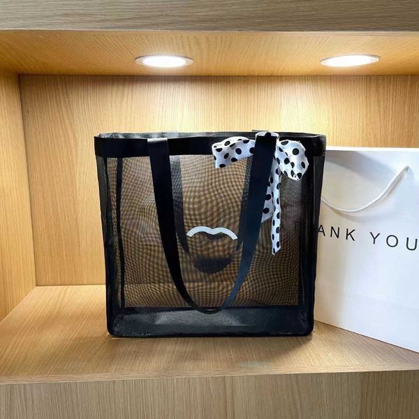 designer channel bag small fragrant wind summer small clear weight fashion simple large letter mesh fashion brand women's handheld bag
designer channel bag small fragrant wind summer small clear weight fashion simple large letter mesh fashion brand women's handheld bag
