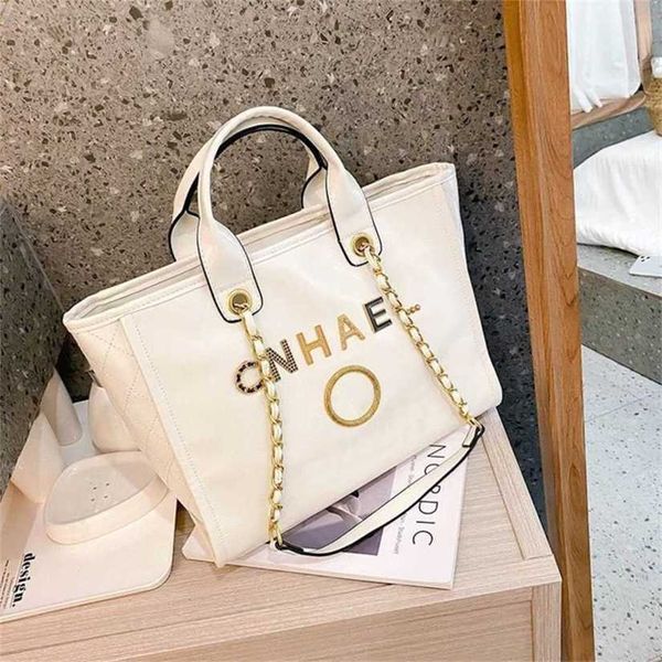 luxury women's classic handbags beach bags metal badge tote bag designer small evening handbag female capacity large leather one should
luxury women's classic handbags beach bags metal badge tote bag designer small evening handbag female capacity large leather one should