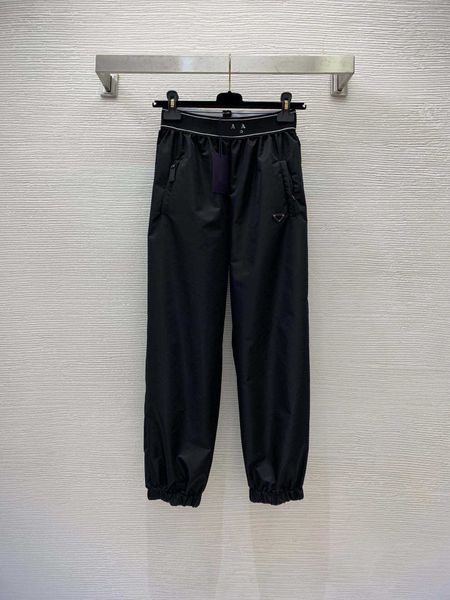 23ss womens pants women designer clothes fashionable solid color new nylon fabric metal triangle ribbon elastic waist tie foot sports pants, Black
23ss womens pants women designer clothes fashionable solid color new nylon fabric metal triangle ribbon elastic waist tie foot sports pants, Black