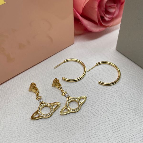 pin buckle saturn earrings women designer jewelry earring stud with diamond copper gold plated for wedding gifts, Golden;silver
pin buckle saturn earrings women designer jewelry earring stud with diamond copper gold plated for wedding gifts, Golden;silver