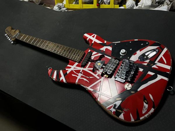 edward eddie van halen heavy relic red franken strat electric guitar black white stripes floyd rose tremolo bridge slanted pickup eye hook s
edward eddie van halen heavy relic red franken strat electric guitar black white stripes floyd rose tremolo bridge slanted pickup eye hook s