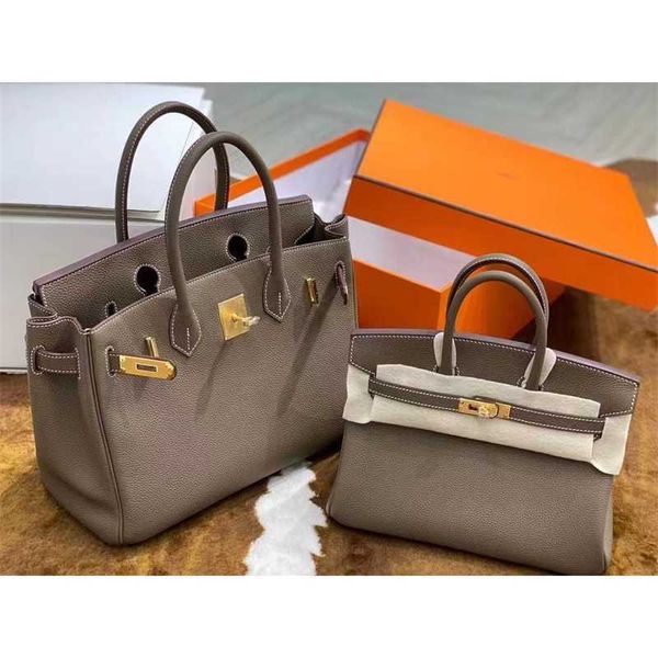 10a h erme s designers handbags birkins layer cowhide lychee grain bag leather women's bag handbag one shoulder messenger bag high sens
10a h erme s designers handbags birkins layer cowhide lychee grain bag leather women's bag handbag one shoulder messenger bag high sens