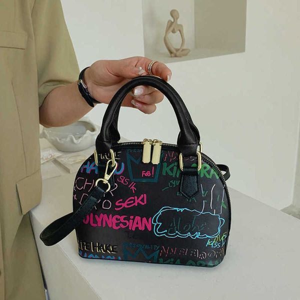 tote bags designer handbag graffiti bag 2023 spring fashion versatile trendy style women s shoulder cross body shell bag 230601
tote bags designer handbag graffiti bag 2023 spring fashion versatile trendy style women s shoulder cross body shell bag 230601