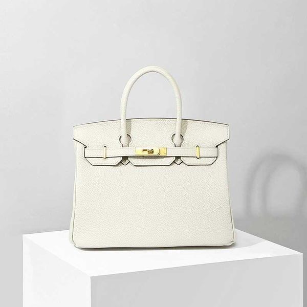 10a h erme s birkins bags 2023 leather layer women's bag lychee grain bag 30cm25cm
10a h erme s birkins bags 2023 leather layer women's bag lychee grain bag 30cm25cm