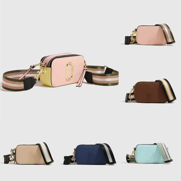 crossbody bags designer bag korean version new snapswomens bag m wide shoulder strap j fashion color matching camera bags handbag 230601
crossbody bags designer bag korean version new snapswomens bag m wide shoulder strap j fashion color matching camera bags handbag 230601