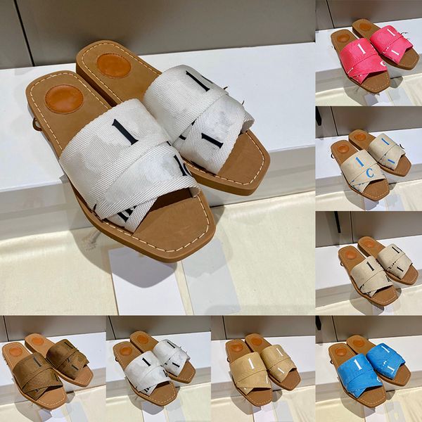 luxurys designer sandals for women ladies fashion woody fabric clogs flat claquette sandale triple black white beige embroid letters woman s
luxurys designer sandals for women ladies fashion woody fabric clogs flat claquette sandale triple black white beige embroid letters woman s