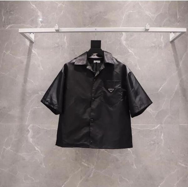 2023 womens and mens shirt casual brand short blouses classic inverted triangle loose imported high-quality nylon tooling summer, White;black
2023 womens and mens shirt casual brand short blouses classic inverted triangle loose imported high-quality nylon tooling summer, White;black
