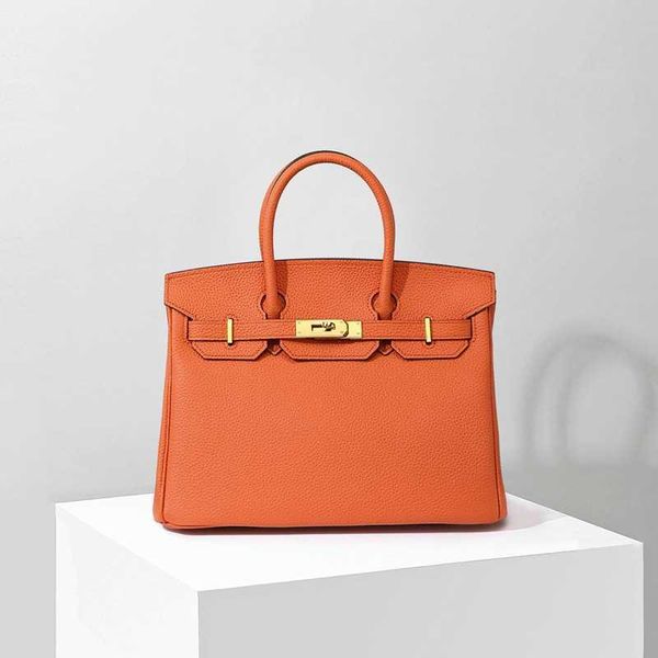 10a h erme s birkin bags leather womens bag highgrade togo layer leather lychee pattern bag single shoulder womens portable messenger bag
10a h erme s birkin bags leather womens bag highgrade togo layer leather lychee pattern bag single shoulder womens portable messenger bag