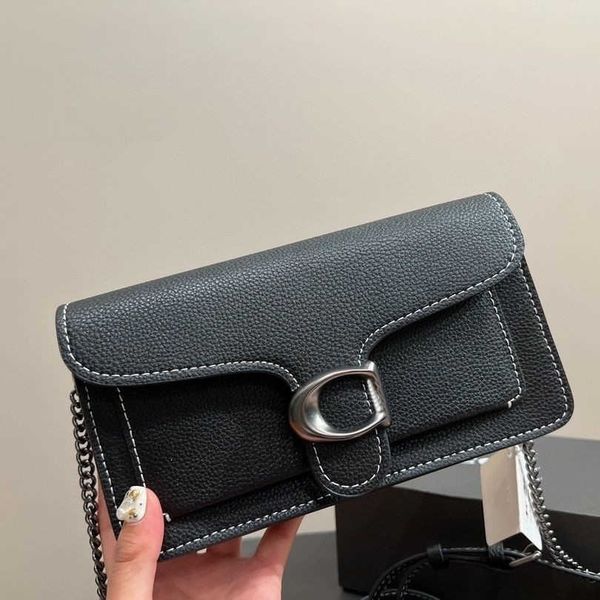 designer dionysians bag coacs shoulder handbag women's leather clamshell magnetic buckle leather clip small square luxury chain crossbo
designer dionysians bag coacs shoulder handbag women's leather clamshell magnetic buckle leather clip small square luxury chain crossbo