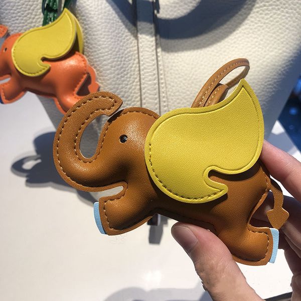 wholesale h-style little flying elephant orange bag pendant pu leather car key kc1u, Silver
wholesale h-style little flying elephant orange bag pendant pu leather car key kc1u, Silver