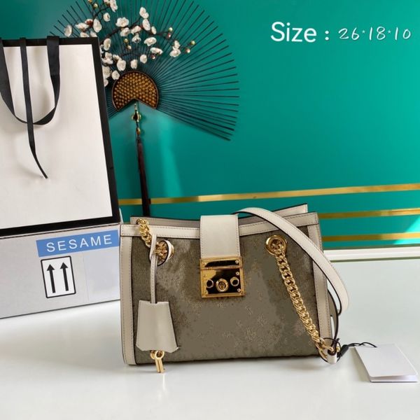 padlock small shoulder bag with a strap that secures with a key lock closure pulled straight from the archives designer crossbody bag
padlock small shoulder bag with a strap that secures with a key lock closure pulled straight from the archives designer crossbody bag