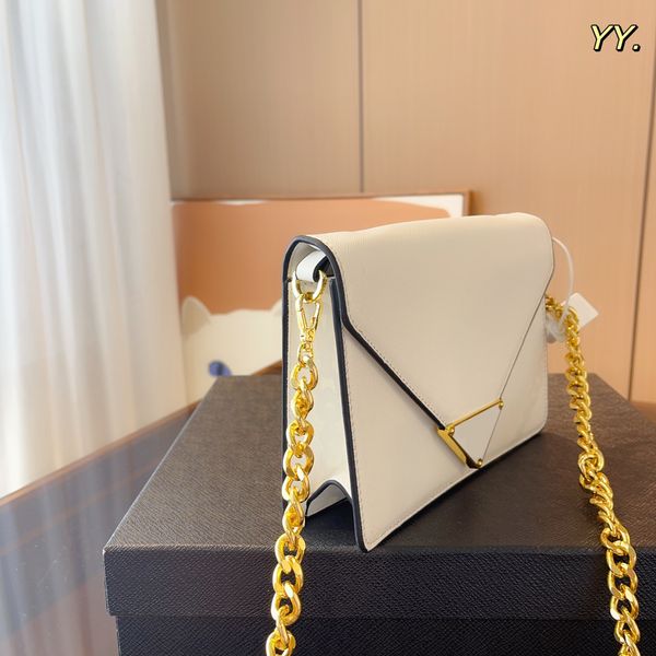 the new monochrome chain bag is a compact, age-reducing leather women's bag designed with a classic triangle label
the new monochrome chain bag is a compact, age-reducing leather women's bag designed with a classic triangle label