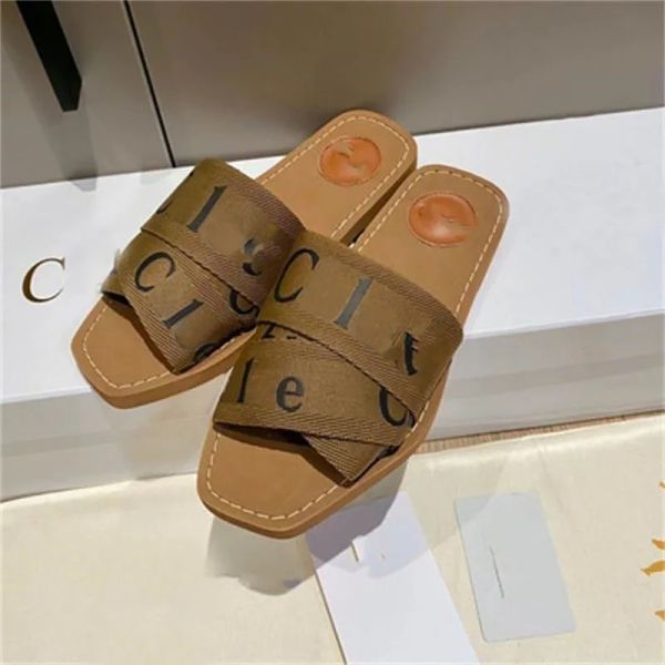 2023 slippers designer women woody flat mules sandals slides sail canvas white black women outdoor beach slipper shoes fashion
2023 slippers designer women woody flat mules sandals slides sail canvas white black women outdoor beach slipper shoes fashion