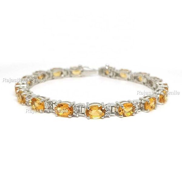 natural citrine and cz 925 sterling silver oval cut gemstone tennis bracelet 7x5 mm stone size
natural citrine and cz 925 sterling silver oval cut gemstone tennis bracelet 7x5 mm stone size