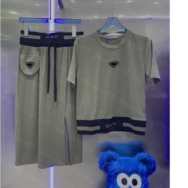23ss womens designer clothing skirt set round neck cotton letter webbing stitching logo embroidery short sleeve t-shirt slit half skirt sets, White
23ss womens designer clothing skirt set round neck cotton letter webbing stitching logo embroidery short sleeve t-shirt slit half skirt sets, White