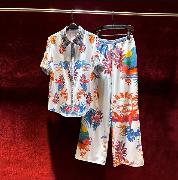 european and american women's clothes 2023 summer new beaded lapel short-sleeved printed shirt wide-leg pants fashion suit, White
european and american women's clothes 2023 summer new beaded lapel short-sleeved printed shirt wide-leg pants fashion suit, White