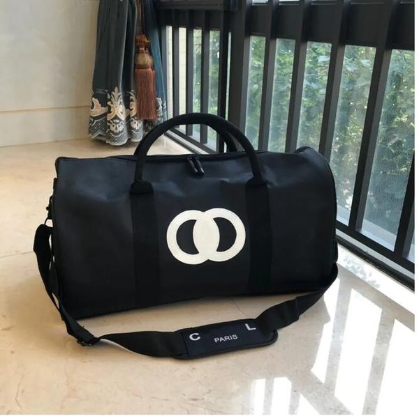 2022 luxury fashion men women high-quality travel duffle bags brand designer luggage handbags with lock large capacity sport bag
2022 luxury fashion men women high-quality travel duffle bags brand designer luggage handbags with lock large capacity sport bag