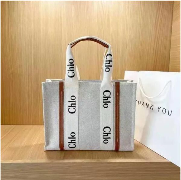 women handbags woody tote shopping bag handbag 7a quality canvas fashion linen large beach bags luxury designer travel crossbody shoulder wa
women handbags woody tote shopping bag handbag 7a quality canvas fashion linen large beach bags luxury designer travel crossbody shoulder wa