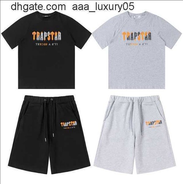 designer fashion clothing tshirt tees trapstar orange grey towel embroidered short sleeve shorts set loose relaxed trendy high street tshirt, White;black 
designer fashion clothing tshirt tees trapstar orange grey towel embroidered short sleeve shorts set loose relaxed trendy high street tshirt, White;black