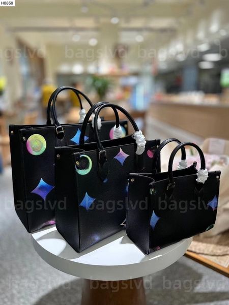 luxurys handbags designer bag tote shoulder bags crossbody women handbag embossed black monograms onthego bags lady shopping bags leather la 
luxurys handbags designer bag tote shoulder bags crossbody women handbag embossed black monograms onthego bags lady shopping bags leather la