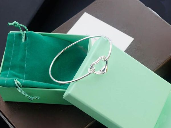 3a chain tf open heart bangle bracelet in silver iconic collection for women with dust bag box fendave, Black
3a chain tf open heart bangle bracelet in silver iconic collection for women with dust bag box fendave, Black